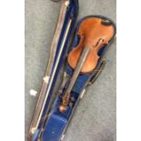 An old violin in case with bow. By Joan Carol Kloz