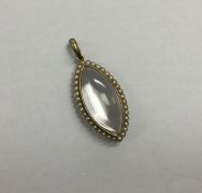 A stylish Victorian pearl drop pendant with large