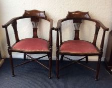 An attractive pair of inlaid bar back chairs on tu