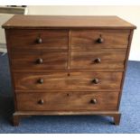 A Georgian mahogany two drawer and two door cupboa