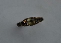 An Antique stone set ring in gold and silver. Appr