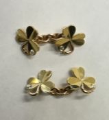 A pair of Irish clover cufflinks inset with diamon