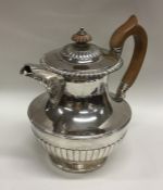 A good quality Georgian silver hot water jug with