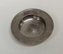 A circular silver armada dish. London. By RC. Appr