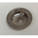 A circular silver armada dish. London. By RC. Appr