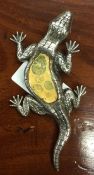 A novelty silver brooch in the form of a lizard. A