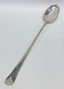 A massive Georgian silver basting spoon. London ci