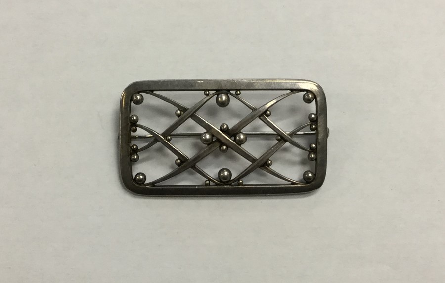 GEORG JENSEN: A rectangular silver brooch with wea