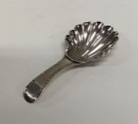 A Georgian silver bright cut caddy spoon with flut