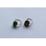 Two 9 carat gem set rings. Approx. 8 grams. Est. £
