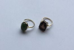 Two 9 carat gem set rings. Approx. 8 grams. Est. £