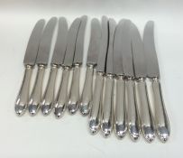 A good set of six (plus six) silver handled knives