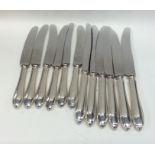 A good set of six (plus six) silver handled knives