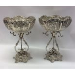A fine pair of massive Indian silver floral decora