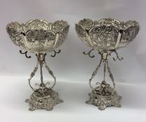 A fine pair of massive Indian silver floral decora