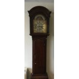 A good Georgian mahogany grandfather clock on brac