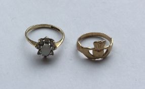Two 9 carat mounted rings. Approx. 2.5 grams. Est.