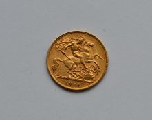 A 1913 half sovereign. Est. £100 - £150.