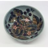 A stylish Moorcroft fruit bowl decorated with flow