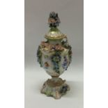 An attractive Meissen floral vase with lift-off co