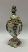 An attractive Meissen floral vase with lift-off co