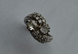 A French platinum set 18 stone diamond crossover r