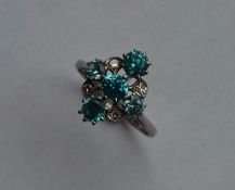 An Art Deco zircon and diamond cluster ring in pl