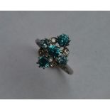 An Art Deco zircon and diamond cluster ring in pl