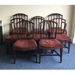 A set of eight Georgian dining chairs with leather