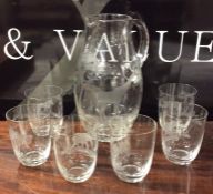 An attractively etched lemonade set decorated with