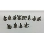 A novelty set of twelve Indian silver menu holders