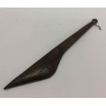 An old wooden tribal spear. Est. £30 - £40.