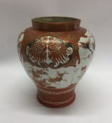 A decorative Kutani vase of typical design. Approx