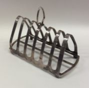 A heavy seven bar silver toast rack. Birmingham. A