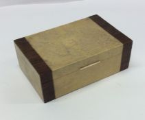 A shagreen and mahogany banded cigarette box with