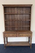 A good stripped pine dresser on turned supports. E