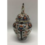 An 18th Century Japanese vase and cover decorated