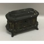 A Continental dome top spelter casket with fitted