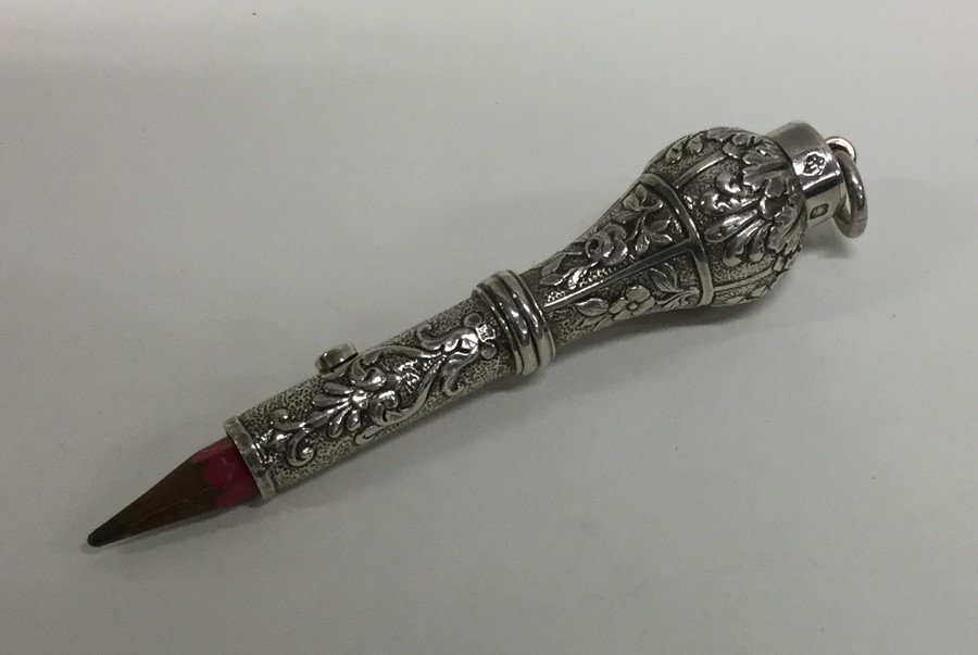 A good quality French extending pencil decorated w