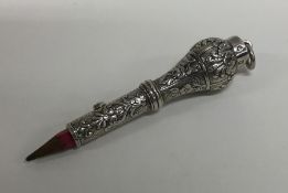 A good quality French extending pencil decorated w