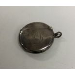 A circular hinged top silver vesta case. Birmingha