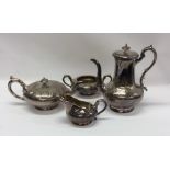 An attractive EPNS engraved four piece tea set. Es