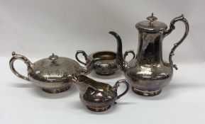 An attractive EPNS engraved four piece tea set. Es