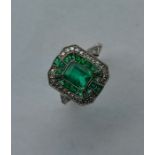 A good platinum mounted emerald and diamond Art De