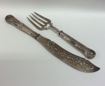 A pair of Kings' pattern silver fish servers with