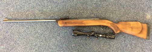 A BSA air rifle and sight. Est. £25 - £35.