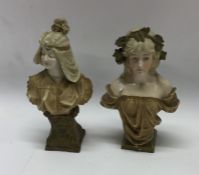 A pair of Royal Dux busts of figures. Est. £10 - £