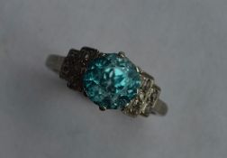 A stylish zircon single stone ring in Art Deco pla