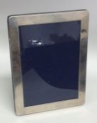 A modern silver picture frame with velvet back. Lo