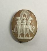 An oval gold framed cameo depicting 'The Three Gra